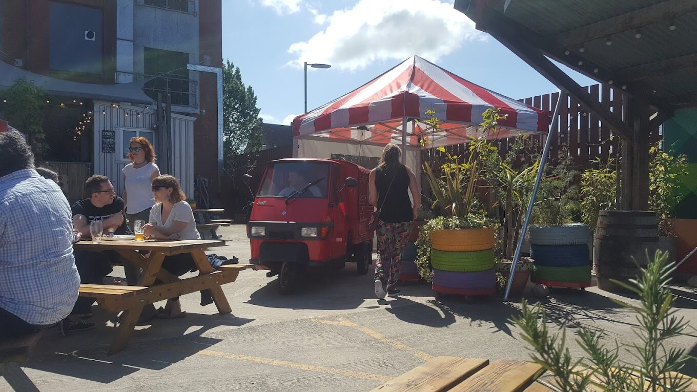 Tobacco Factory's expansive outdoor space filled with people attending a beer festival or street food market