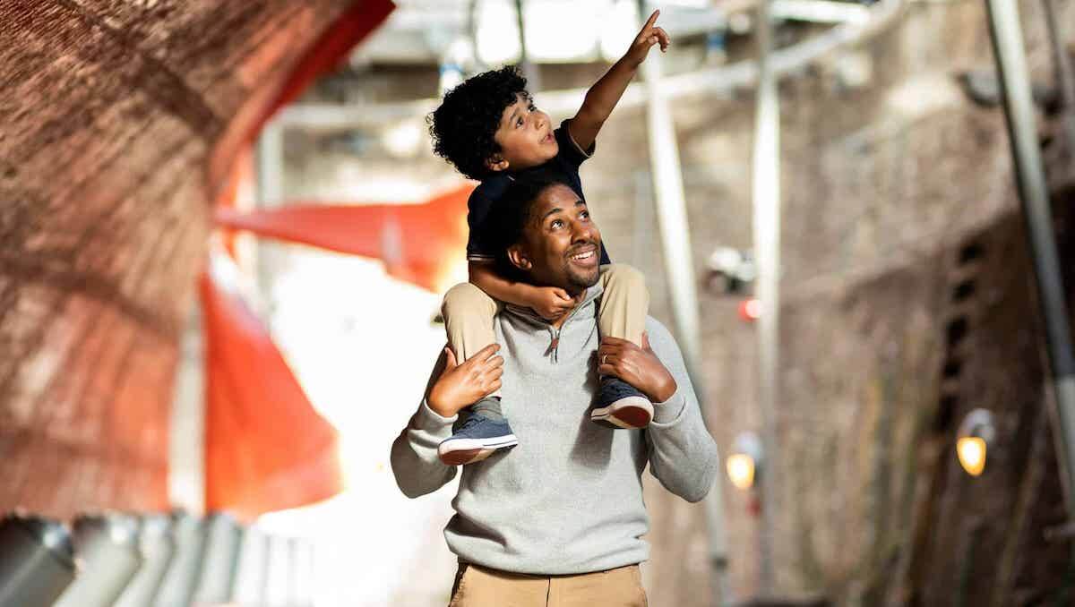 Children exploring the historic SS Great Britain, a 19th-century steamship turned museum, located in Bristol's Harbourside